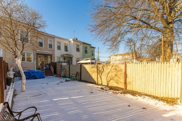 view of snow covered patio