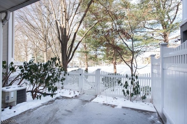 snow covered gate with central AC