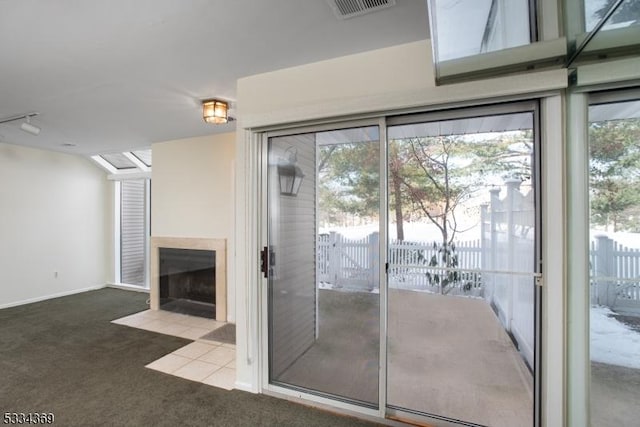 interior space featuring carpet floors and a wealth of natural light