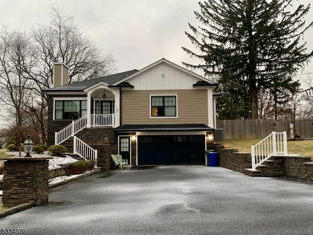 view of front of property with a garage