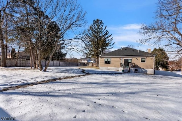 view of snow covered property