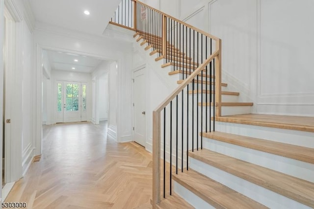 stairway with parquet floors