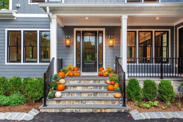 doorway to property with covered porch