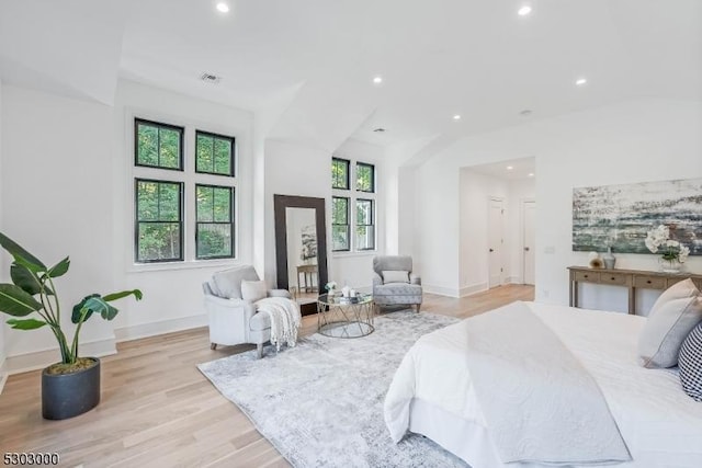 bedroom with light wood-type flooring