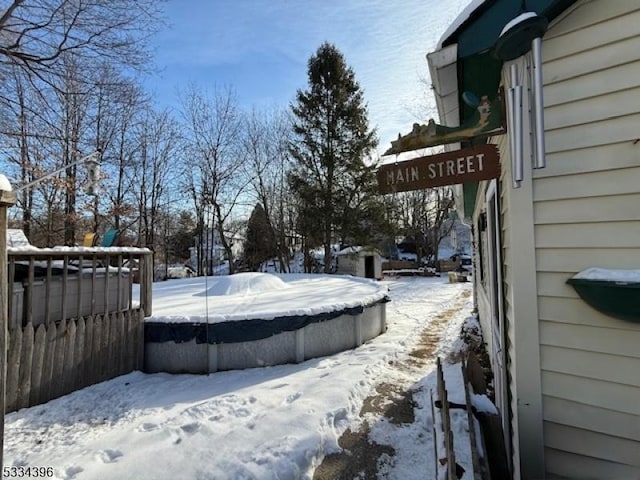 view of yard covered in snow