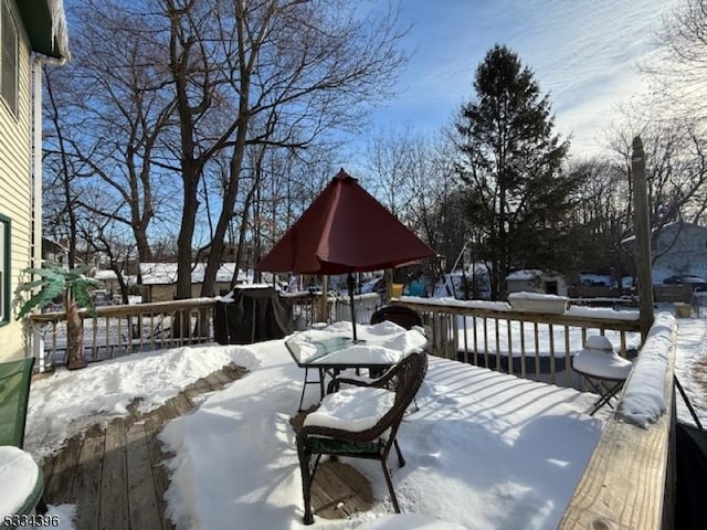 view of snow covered deck