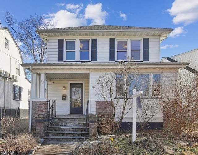 view of front of property featuring covered porch