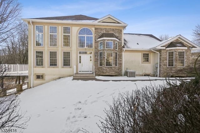 view of front of property featuring central AC unit