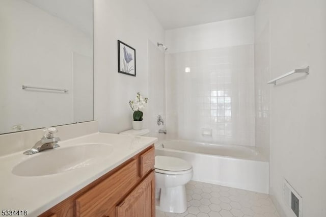 full bathroom with shower / bath combination, vanity, tile patterned floors, and toilet