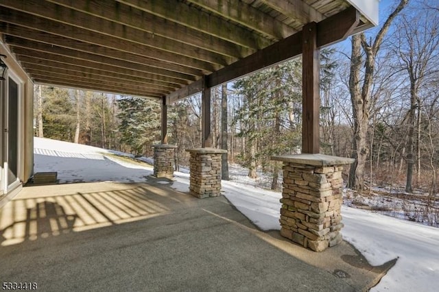 view of snow covered patio