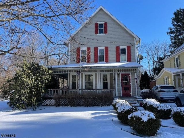 view of front of home featuring covered porch