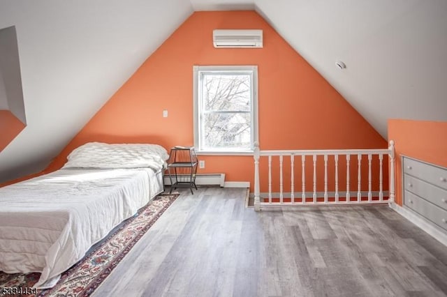 unfurnished bedroom featuring wood-type flooring, an AC wall unit, lofted ceiling, and baseboard heating