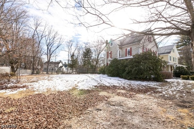 view of yard covered in snow