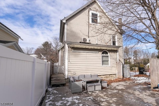 view of snow covered house