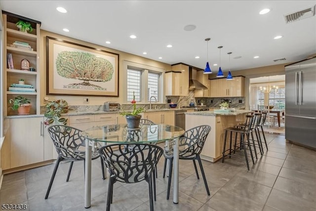 dining room with recessed lighting, visible vents, plenty of natural light, and an inviting chandelier