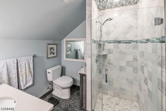 bathroom featuring walk in shower, vanity, toilet, and vaulted ceiling