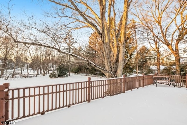 view of snow covered deck