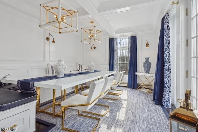 dining space with coffered ceiling, a notable chandelier, ornamental molding, and beamed ceiling