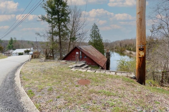 view of yard with a water view