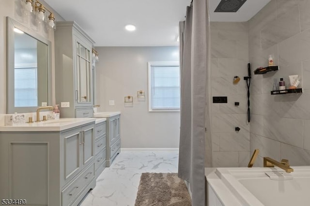 bathroom featuring vanity and independent shower and bath