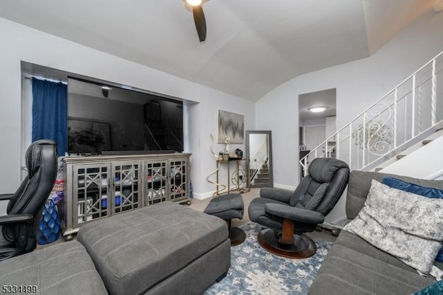 living room with lofted ceiling and ceiling fan