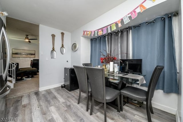 dining area featuring hardwood / wood-style flooring