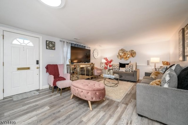 living room featuring light wood-type flooring