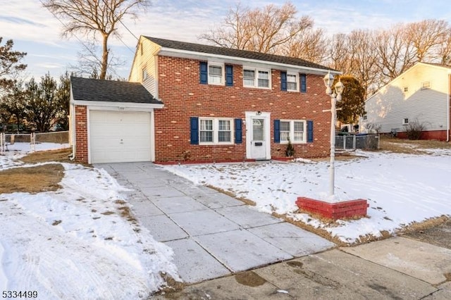 view of front of property featuring a garage