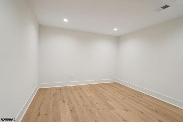 empty room featuring light hardwood / wood-style floors