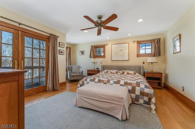 bedroom featuring ceiling fan and light wood-type flooring