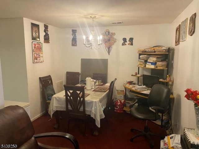 dining room featuring a notable chandelier