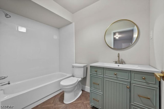 full bathroom with vanity, parquet flooring, washtub / shower combination, and toilet