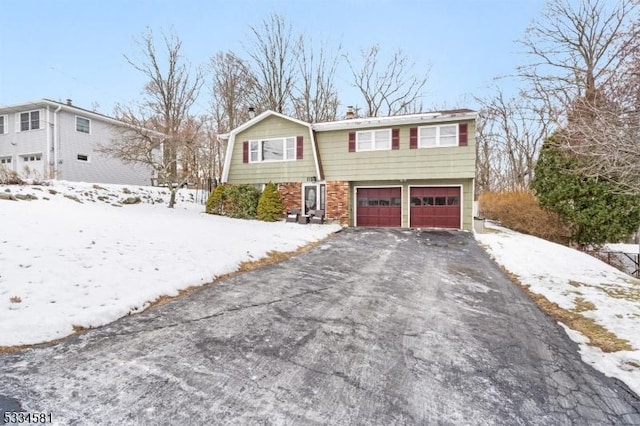 view of front of home with a garage