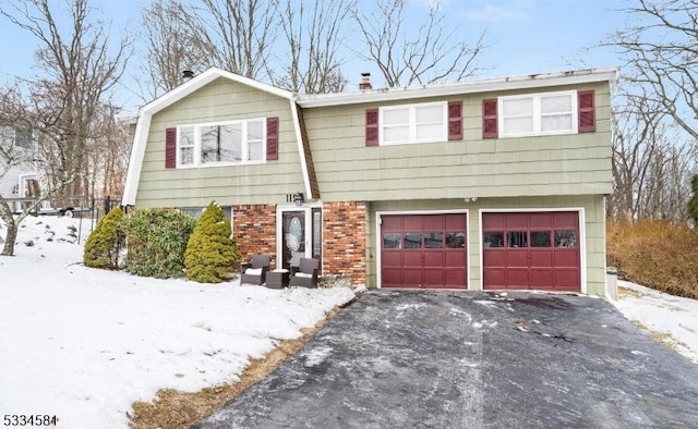 view of front of property featuring a garage