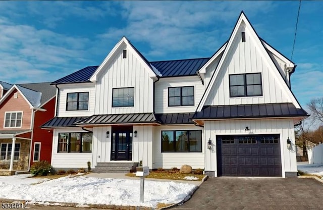 modern farmhouse style home with a garage