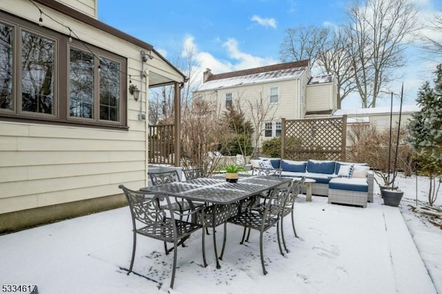 view of snow covered patio