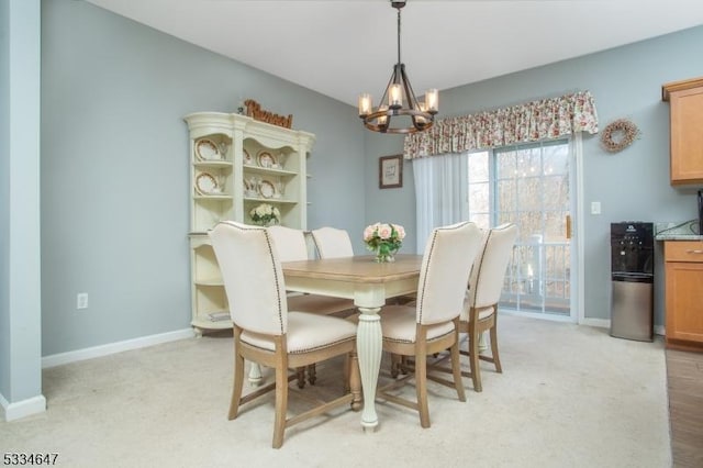 dining room featuring a notable chandelier