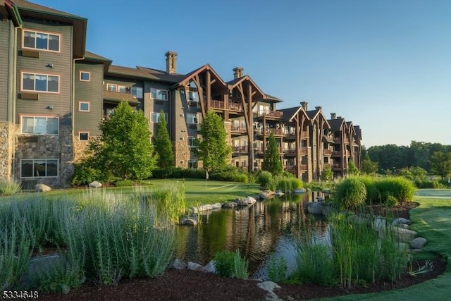 view of community featuring a water view