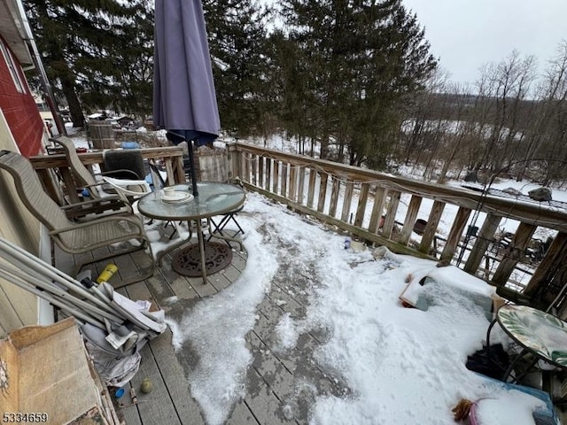 view of snow covered deck