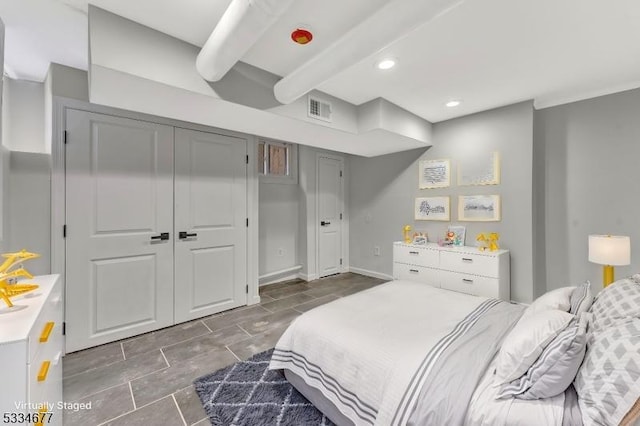 bedroom with beam ceiling