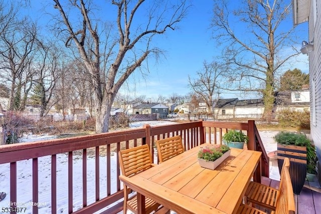 view of snow covered deck