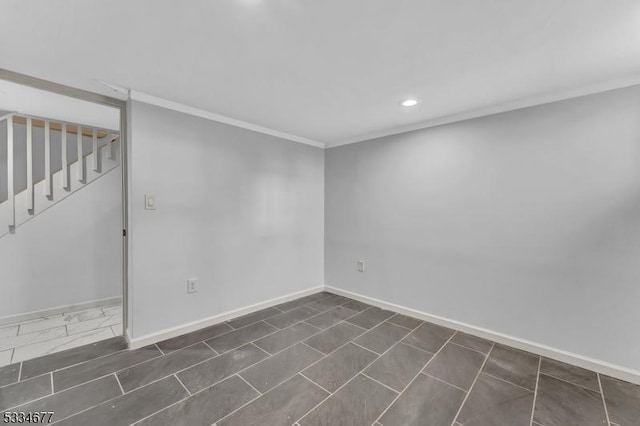 unfurnished room featuring ornamental molding