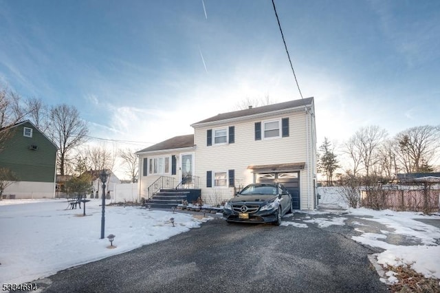 view of front of property featuring a garage