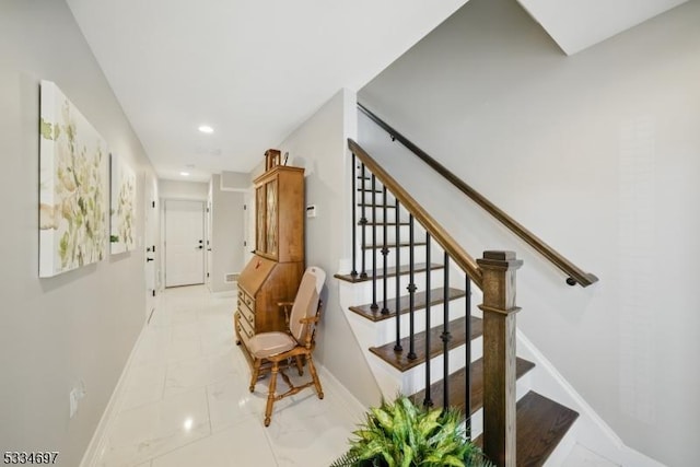24 Stonybrook Cir, Fairfield Twp, NJ 07004 - stairway featuring baseboards, marble finish floors, and recessed lighting
