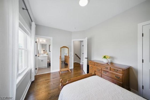24 Stonybrook Cir, Fairfield Twp, NJ 07004 - bedroom featuring wood finished floors, baseboards, and ensuite bathroom