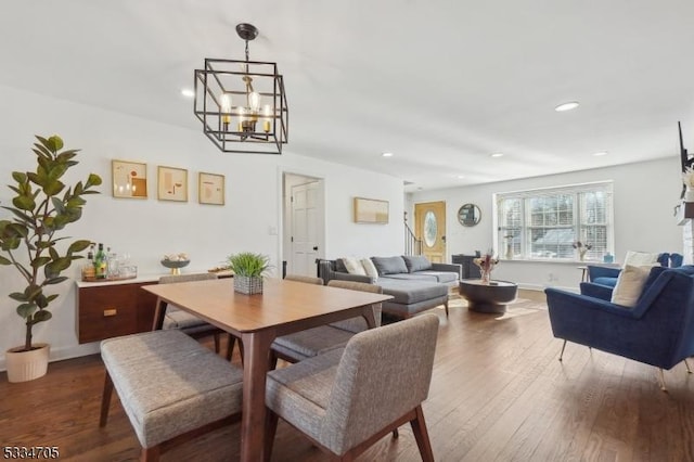 dining area with hardwood / wood-style flooring