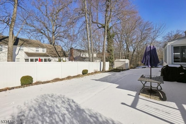 view of snow covered patio