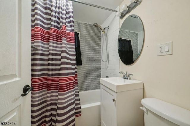 full bathroom featuring shower / tub combo, vanity, and toilet