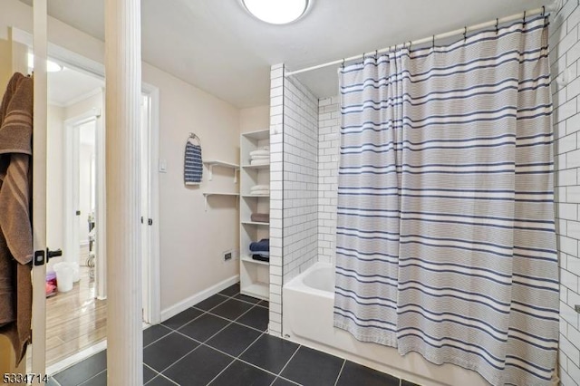 bathroom with tile patterned flooring and shower / bathtub combination with curtain