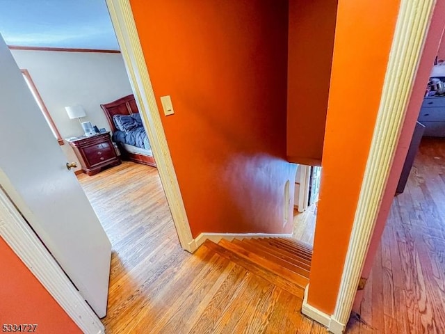 corridor featuring light hardwood / wood-style floors